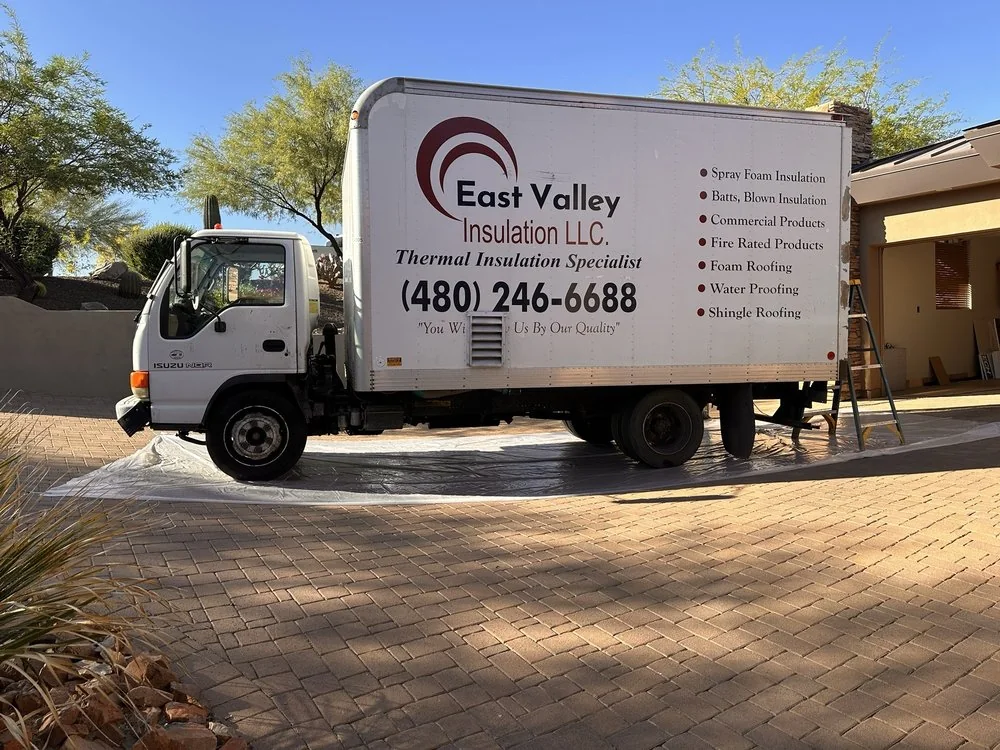 East Valley Insulation service truck at a customer property